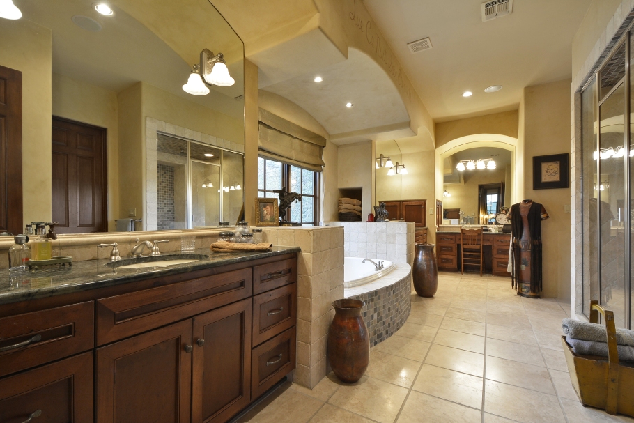 Master Bath has custom cabinetry with highend granite counter tops 